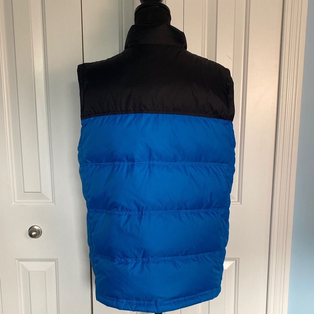 The North Face 18-20 Year Old 550 Vibrant Blue and Black Reversible Vest - Picture 4 of 11